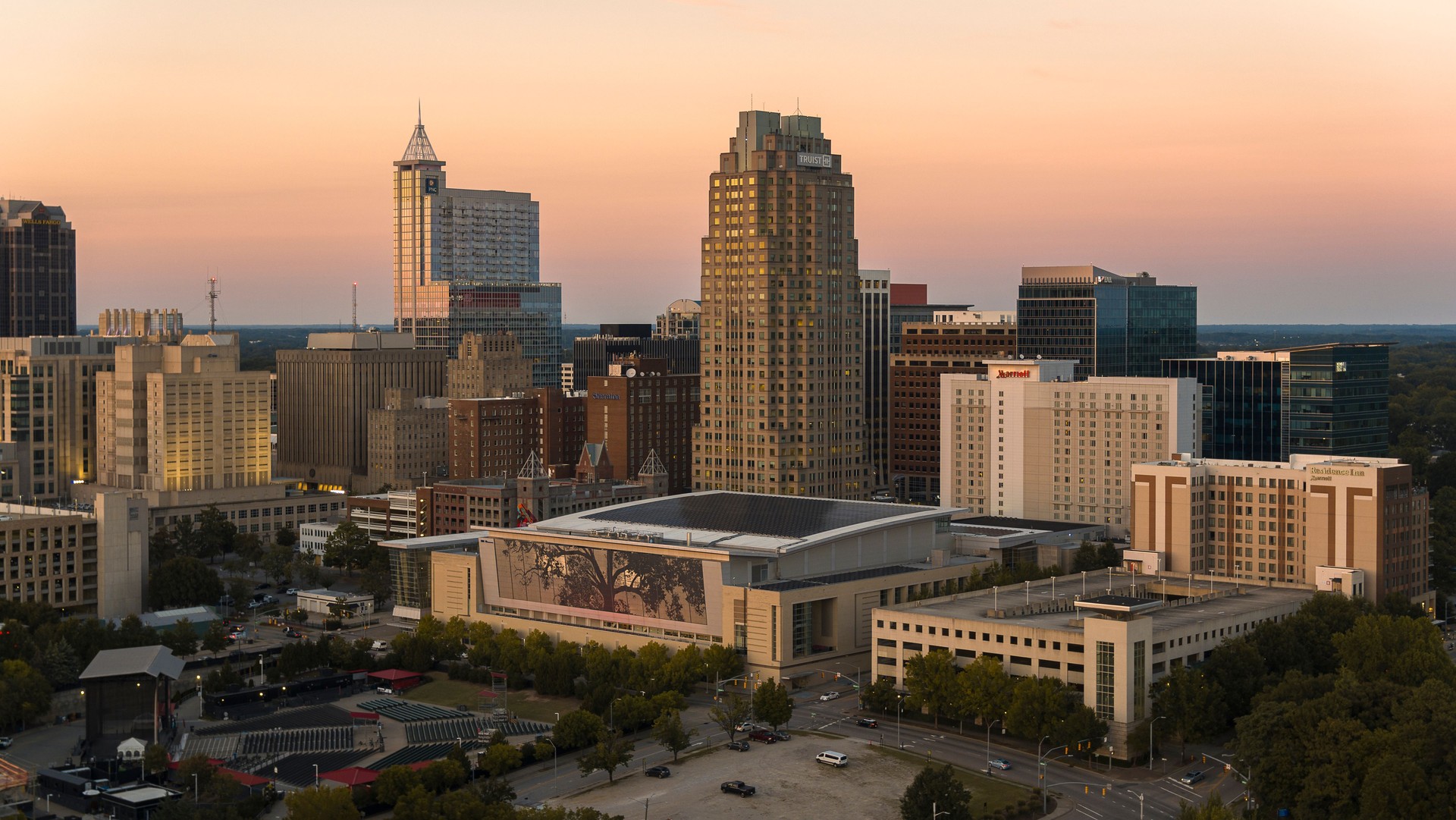 Twilight in the urban center of Raleigh in North Carolina. Art complexes and office skyscrapers line the Downtown