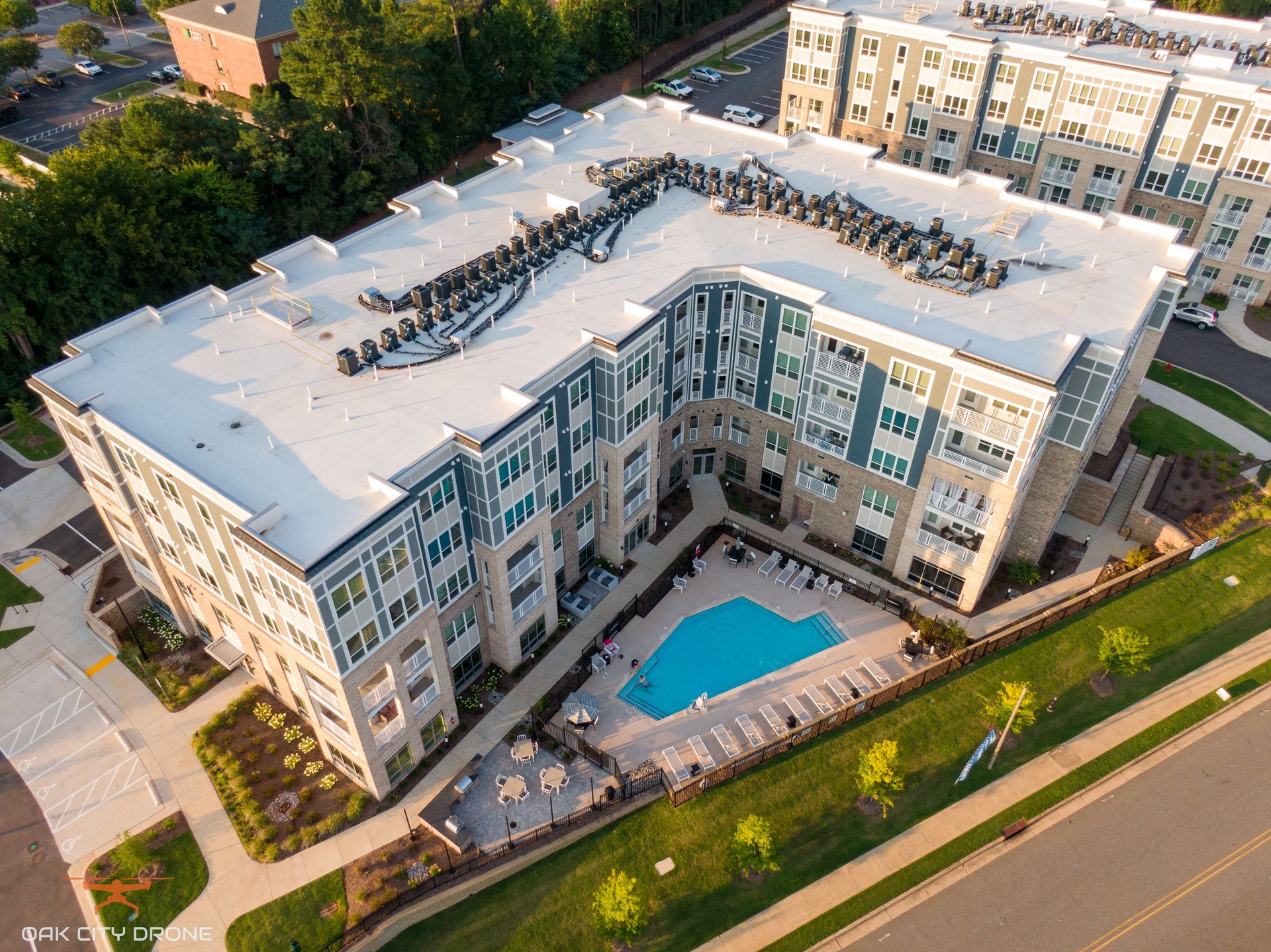 Aerial View of Modern Apartment Complex with Pool in Raleigh, North Carolina